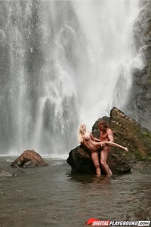 Wild blond-haired nympho gets banged near a beautiful waterfall