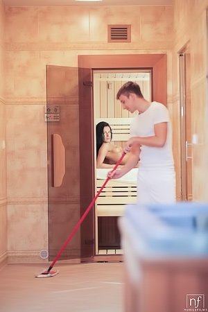 Skinny brunette with long legs decides to fuck the janitor in a sauna